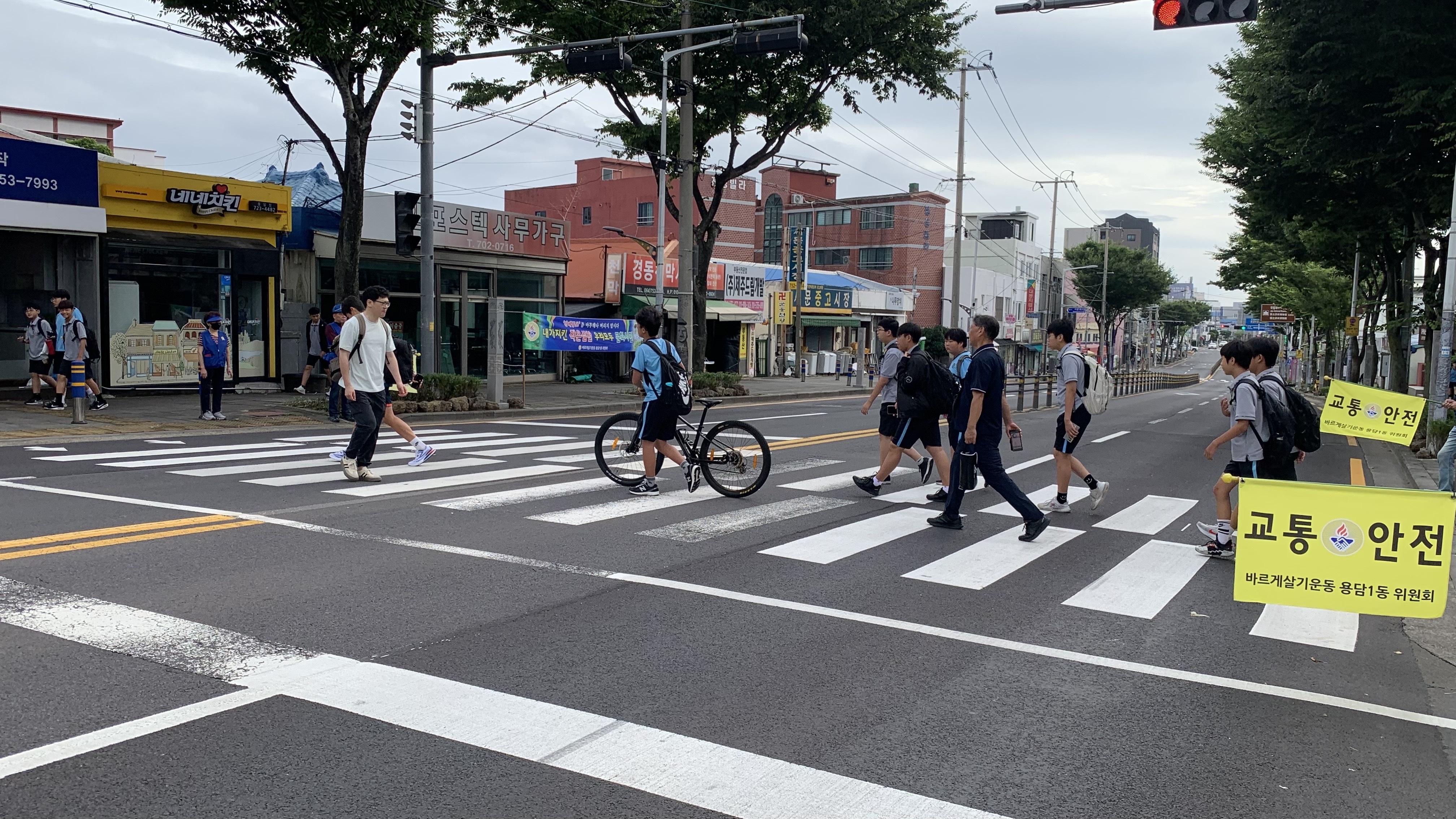 바르게살기운동용담1동위원회, 교통질서 계도 봉사활동 전개 첨부이미지