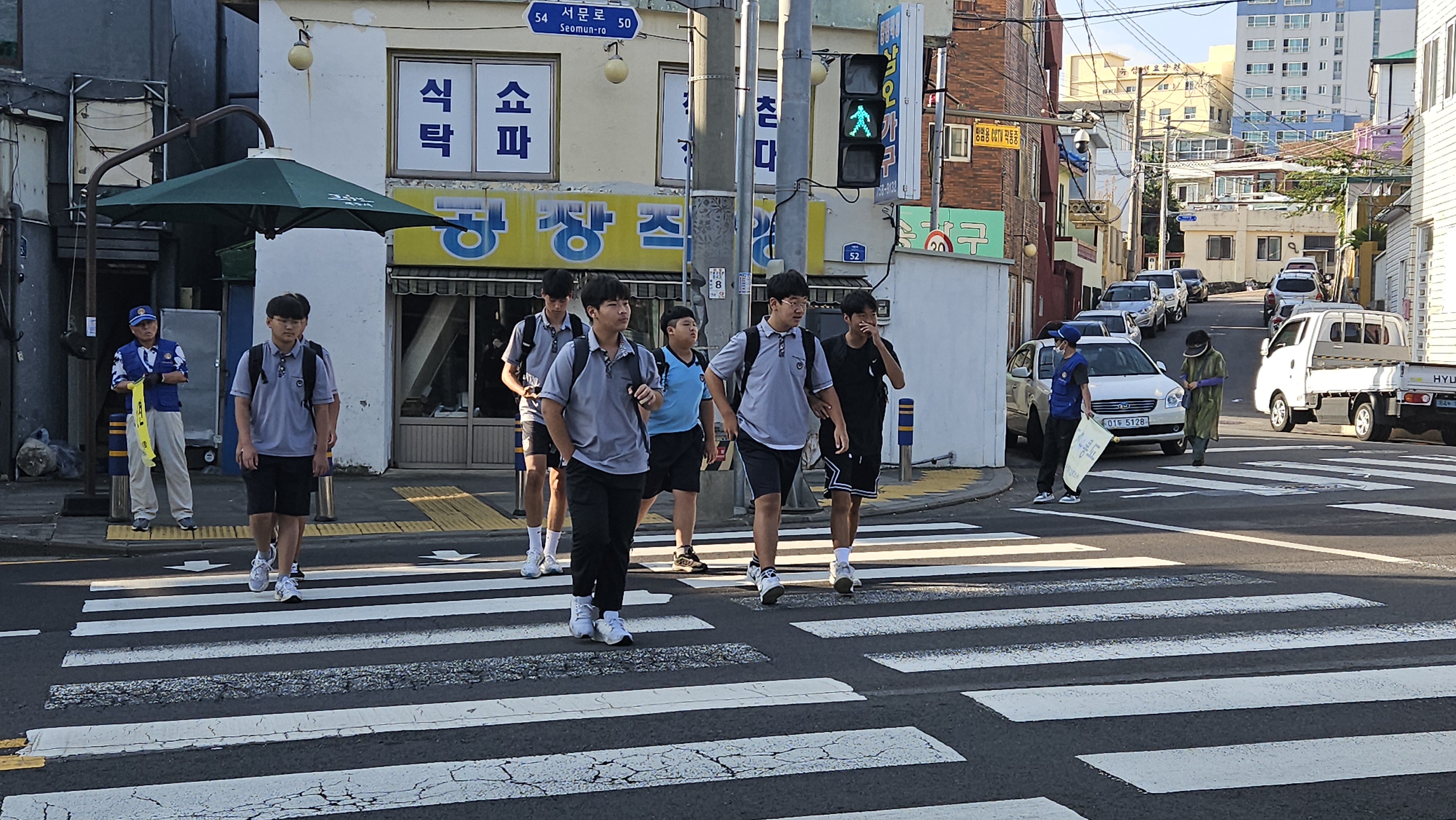 바르게살기운동용담1동위원회, 현수막 게첨·거리질서 캠페인·교통질서 계도 전개 첨부이미지